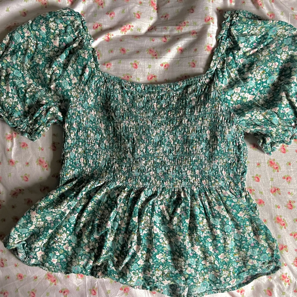 green floral blouse